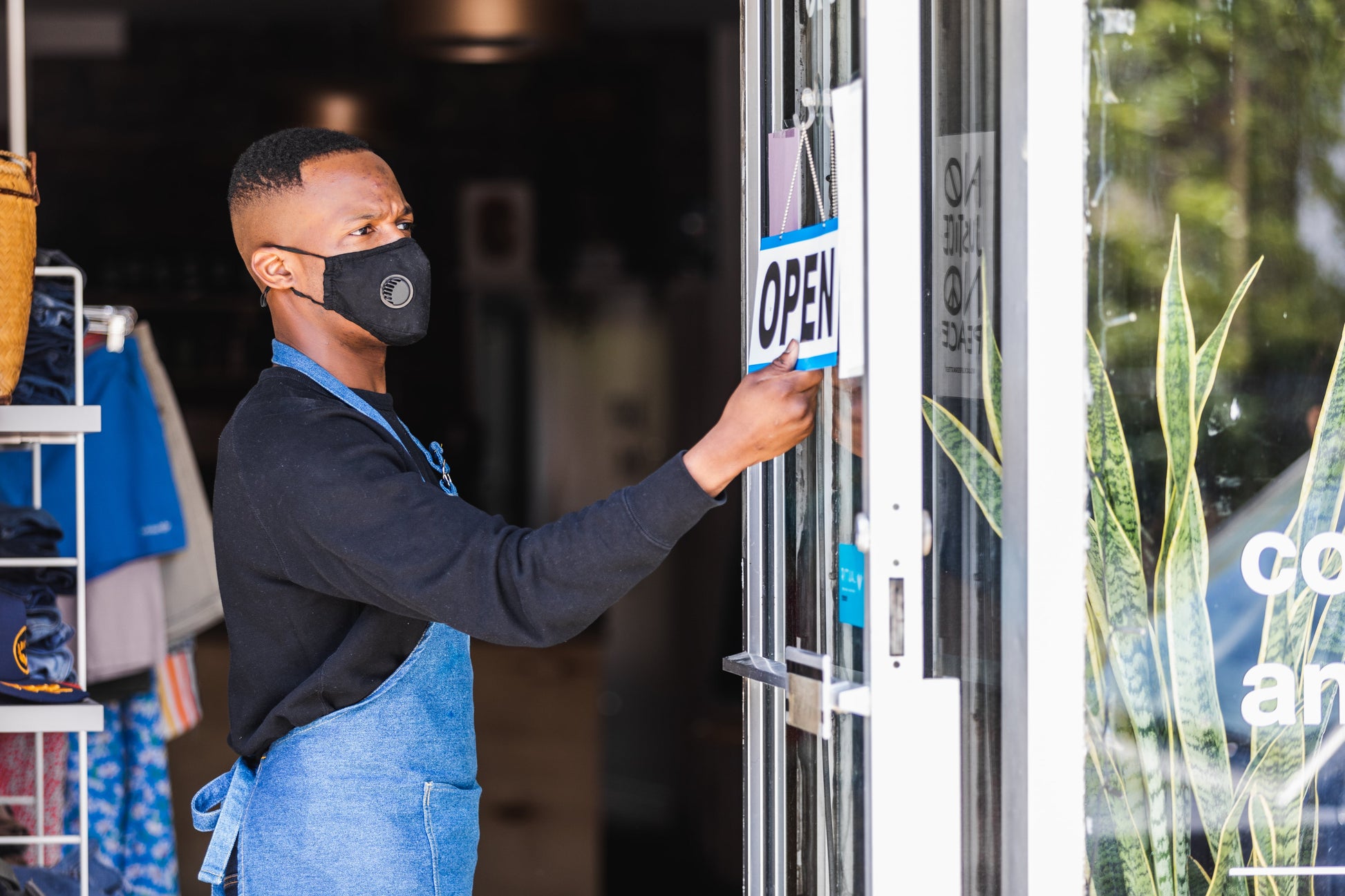 man wearing mask flipping over open sign on door for retail store Photo by <a href="https://www.shopify.com/stock-photos/@matthew_henry?utm_campaign=photo_credit&amp;utm_content=Browse+Free+HD+Images+of+Opening+The+Retail+Store+For+The+Day&amp;utm_medium=referral&amp;utm_source=credit">Matthew Henry</a> from <a href="https://www.shopify.com/stock-photos/customer?utm_campaign=photo_credit&amp;utm_content=Browse+Free+HD+Images+of+Opening+The+Retail+Store+For+The+Day&amp;utm_medium=referral&amp;utm_source=cred